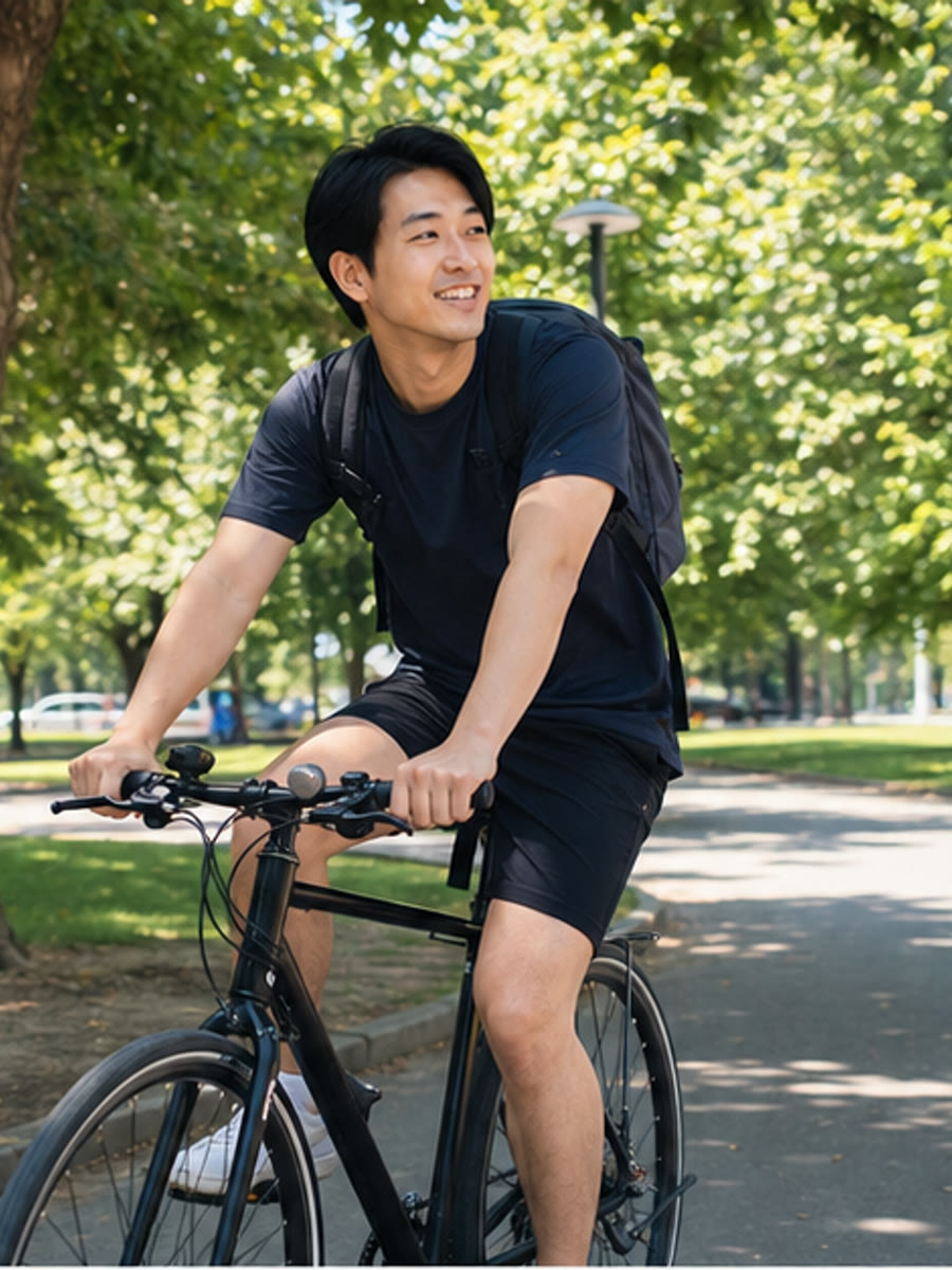 A man taking a break from a bike ride